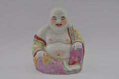 painted porcelain figurine buddha sitting