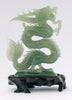 A superb carved green jade Dragon with loose carved ball in its mouth