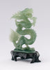 A superb carved green jade Dragon with loose carved ball in its mouth