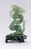 A superb carved green jade Dragon with loose carved ball in its mouth