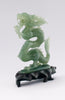A superb carved green jade Dragon with loose carved ball in its mouth