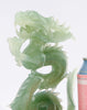 A superb carved green jade Dragon with loose carved ball in its mouth