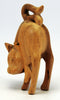 Carved wood cat, ready to pounce