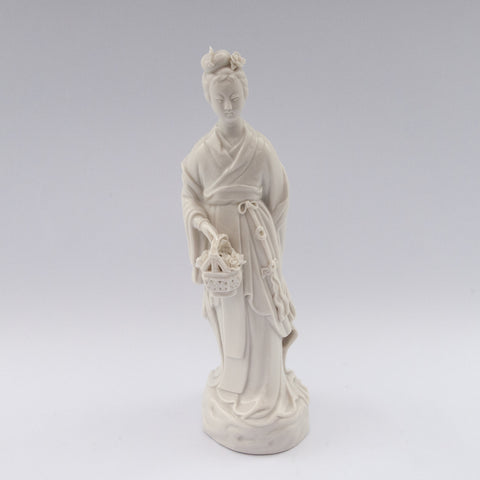 white porcelain figurine blanc de chine lady basket