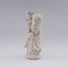 white porcelain figurine blanc de chine wiseman staff peach