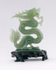 A superb carved green jade Dragon with loose carved ball in its mouth