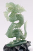 A superb carved green jade Dragon with loose carved ball in its mouth