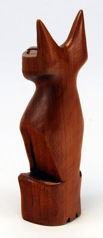 Small carved cat, upright with sharp features