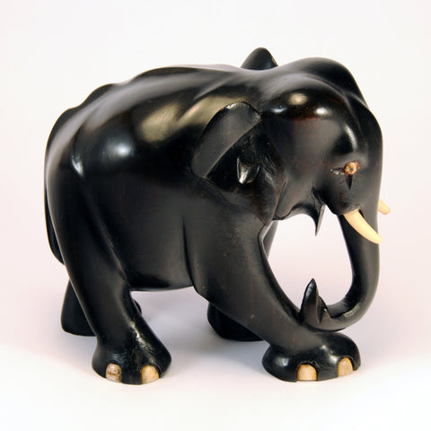 carved dark wood elephant 1