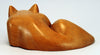Carved wood cat, laying flat