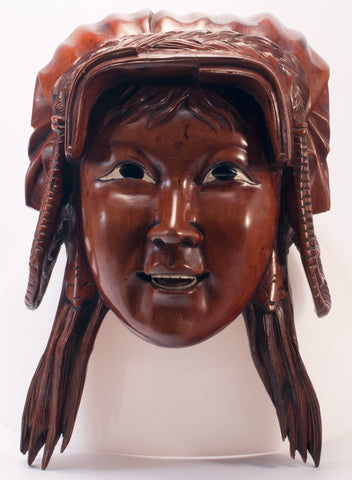 carved wood indian female face