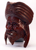 carved wood indian male face