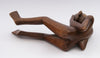 carved wood lady naked sitting sorrow