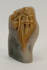 cheeky small carved soapstone wiseman hugging peach 020