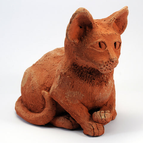 Terracotta textured clay cat ornament, contently sitting pose.