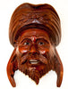 carved wood indian male face