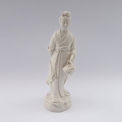 white porcelain figurine blanc de chine lady basket